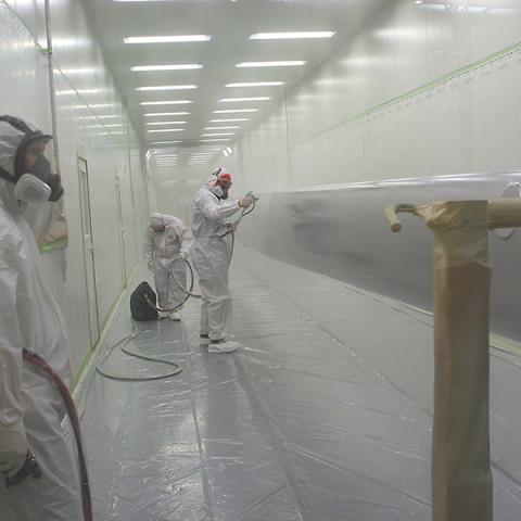 65m spars being spray painted.